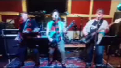 Short clip of the band playing in a rehearsal room
